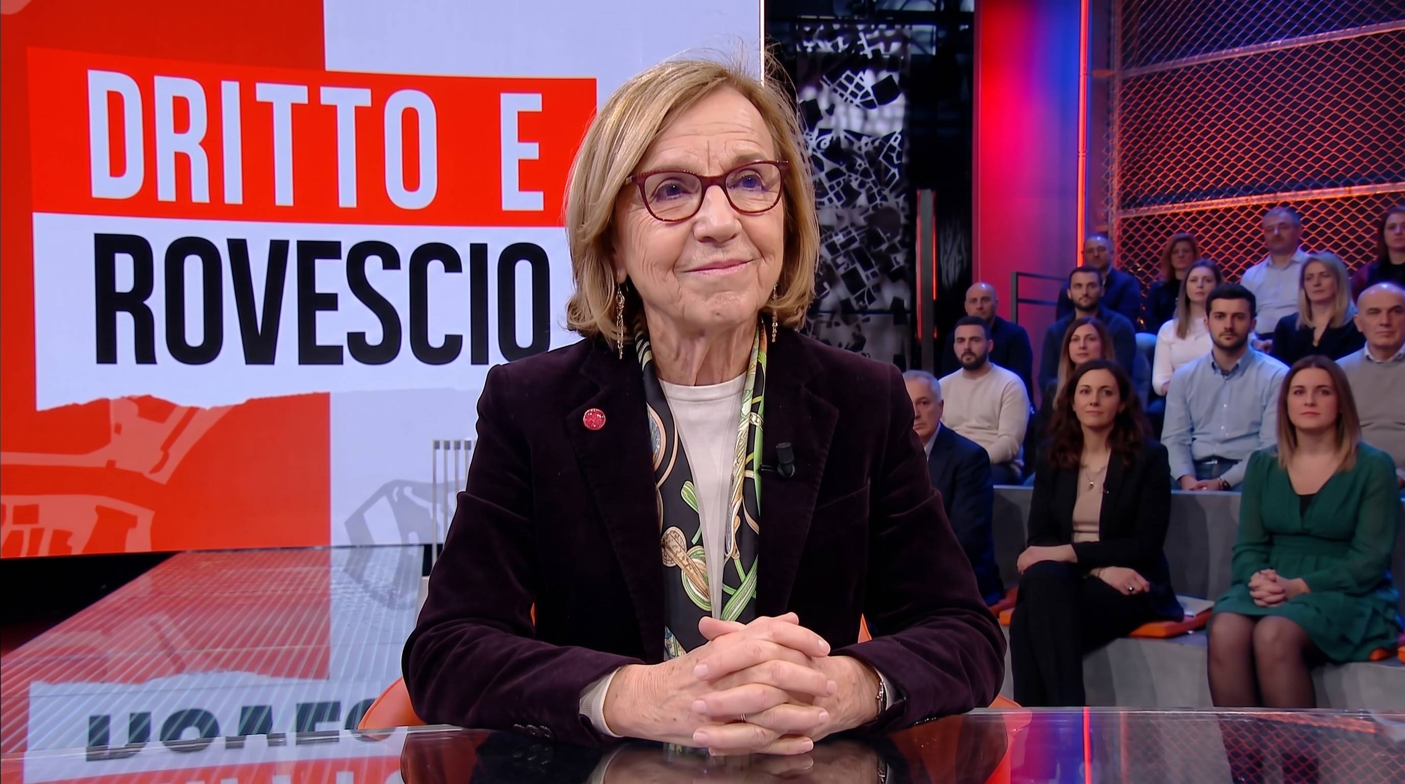 Elsa Fornero sorride rispondendo a Paolo Del Debbio